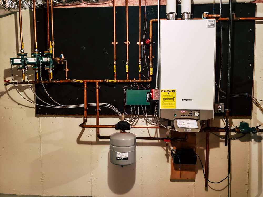 Professional plumber installing water heater in Gridley, CA