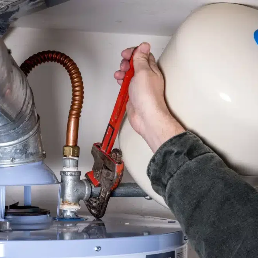 High efficiency tankless water heater unit on a wall
