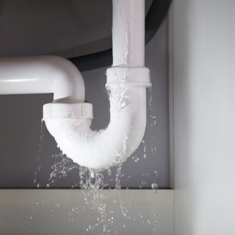 Professional plumber repairing kitchen sink in Butte County, CA