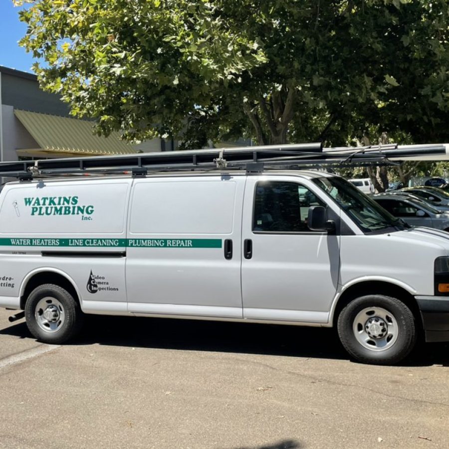 Local plumber with equipment providing plumbing service near me